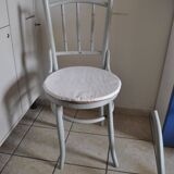 Pair of Lichtig bistro chairs in painted grey beech, pressed seat, circa 1900.