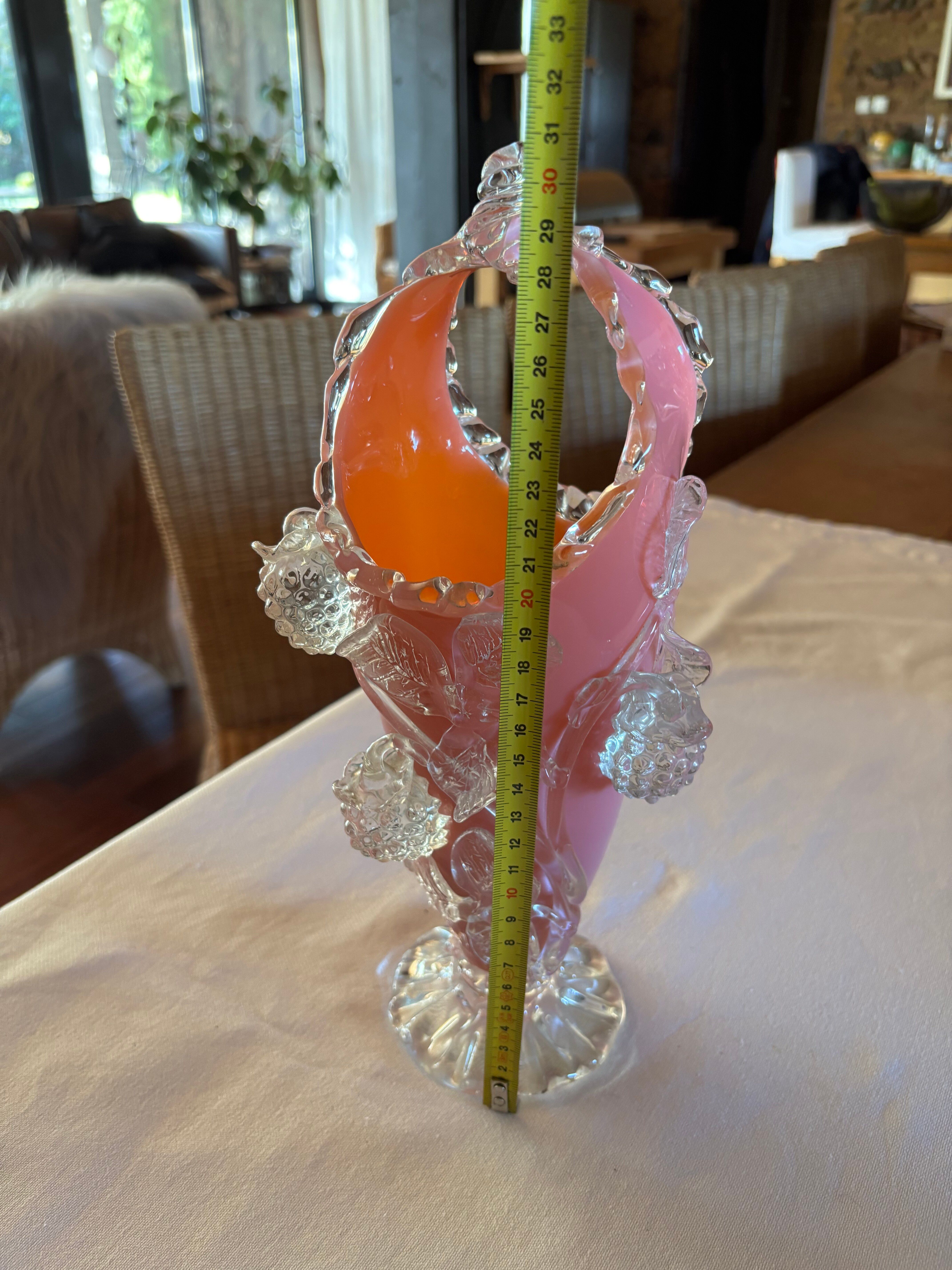 Pink opaline vase with added fruits
