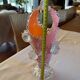 Pink opaline vase with added fruits