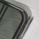 Pair of nesting tables in smoked glass and chrome legs.