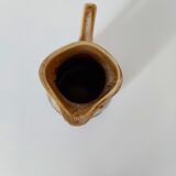 Vintage pitcher revol