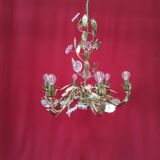 Chandelier with golden foliage and grapevines