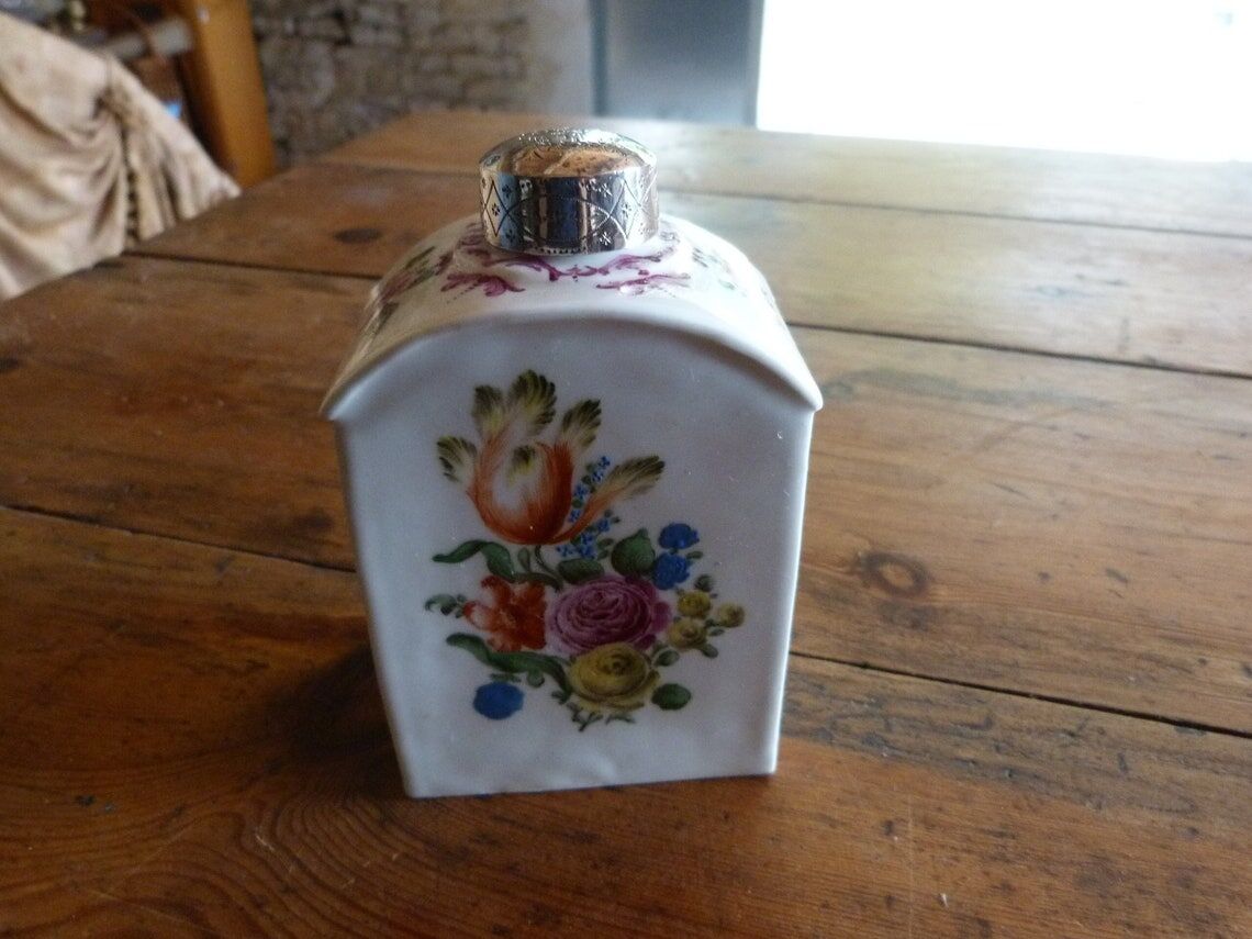 Floral porcelain bathroom bottle with engraved silver cap