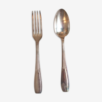 Old silver metal spoon and fork