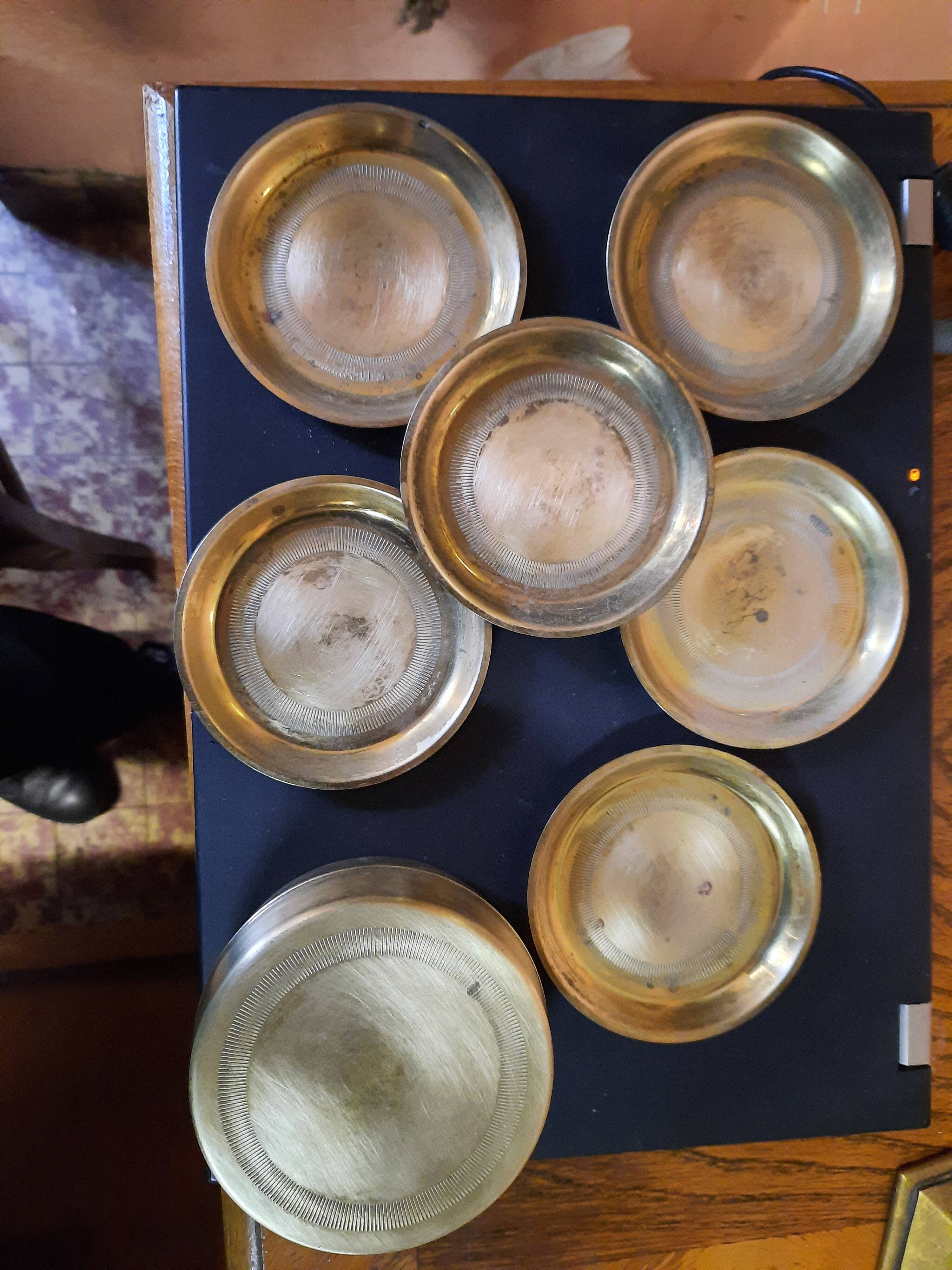 Set of brass coasters