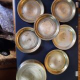 Set of brass coasters