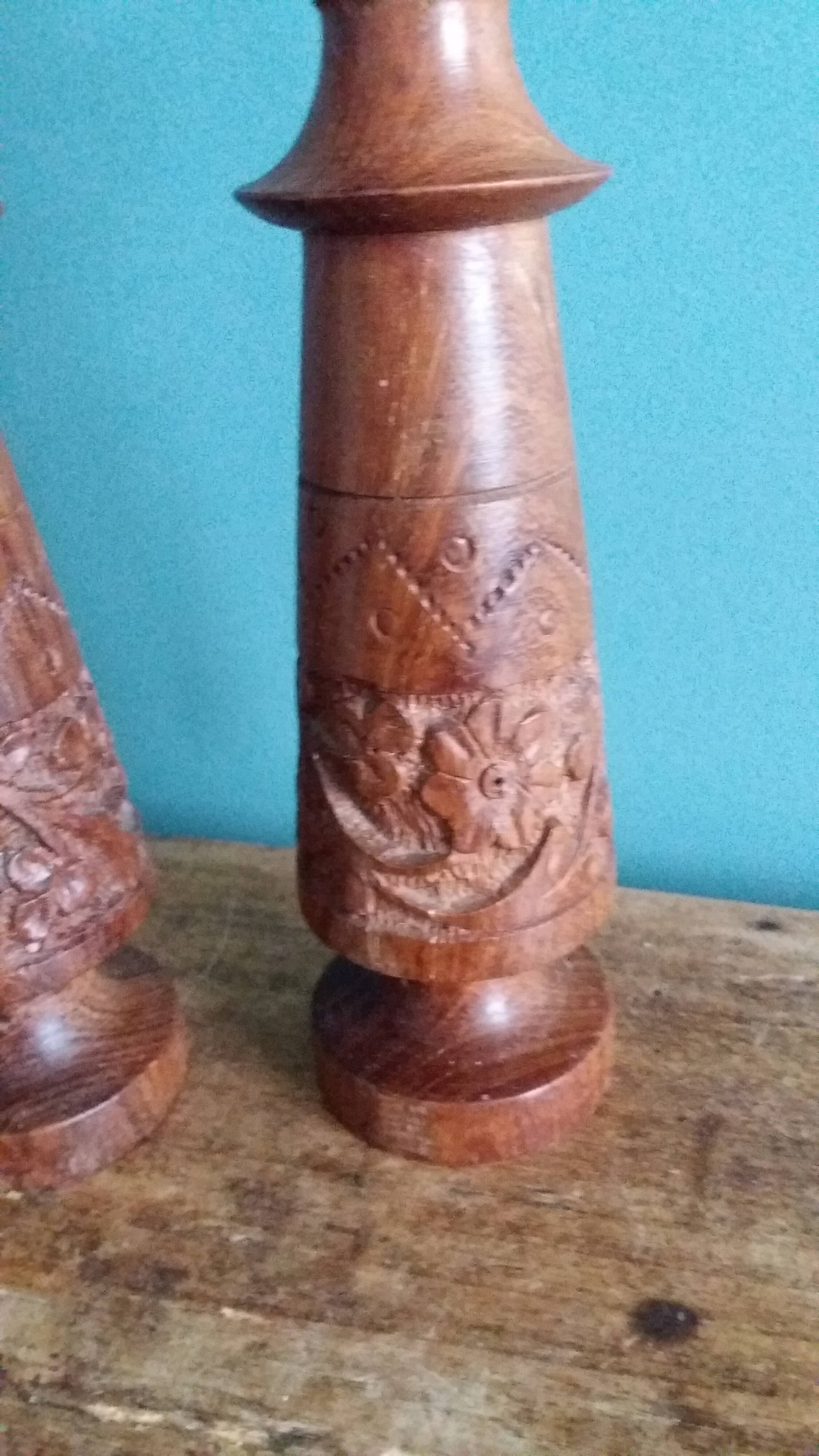 Bohemian candle holders made of turned and carved wood.