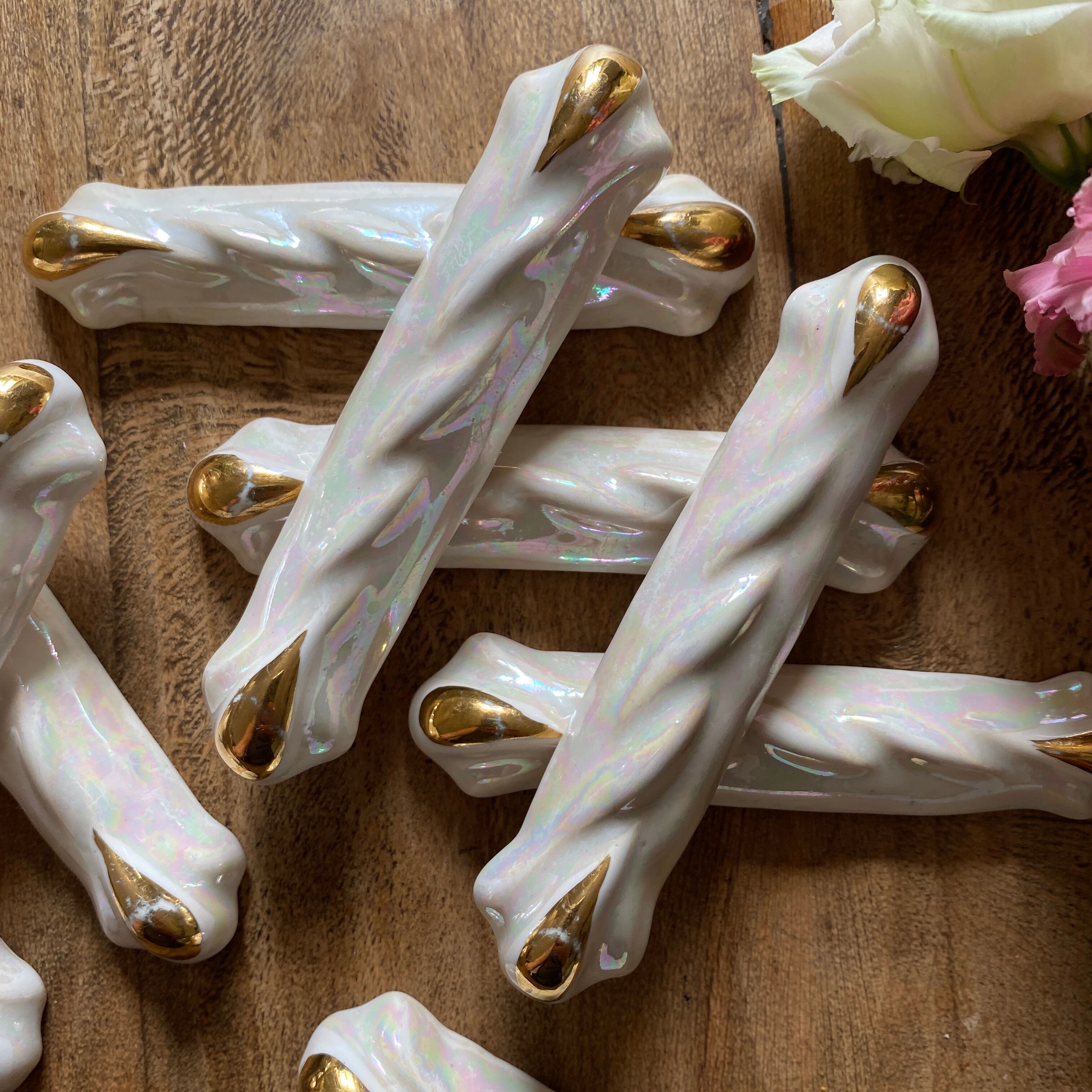 Set of 9 vintage art deco knife holders in pearly and gold ceramic