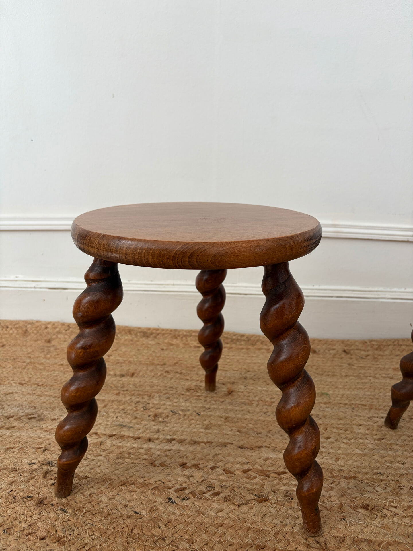 Pair of twisted wooden tripod stools