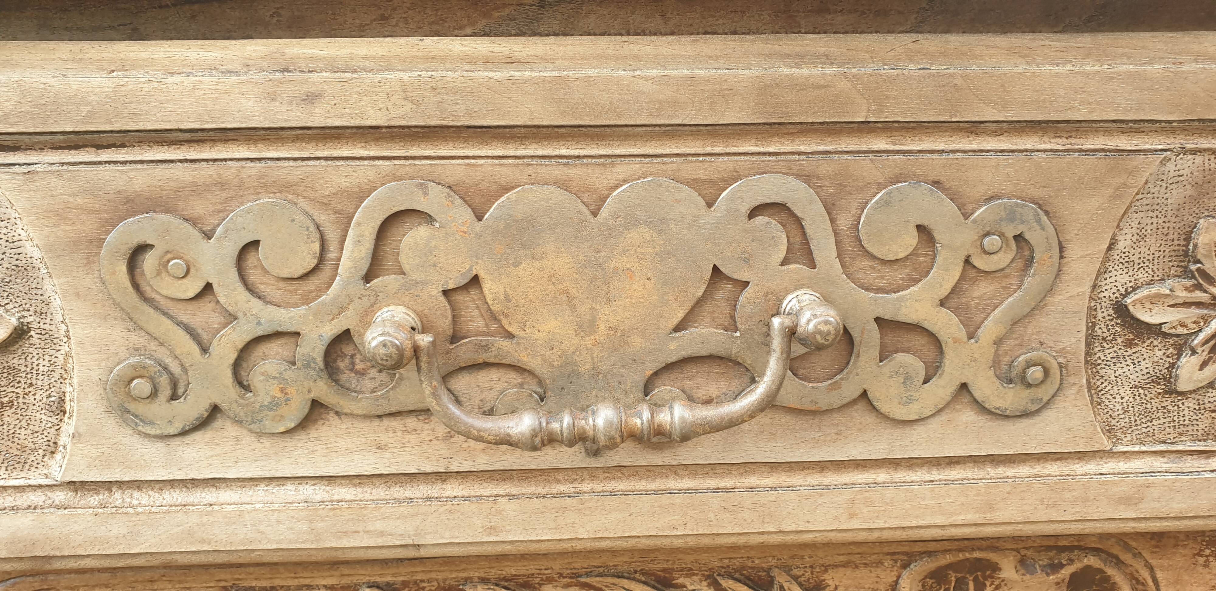 Provencal furniture in finely carved light walnut with wrought ironwork