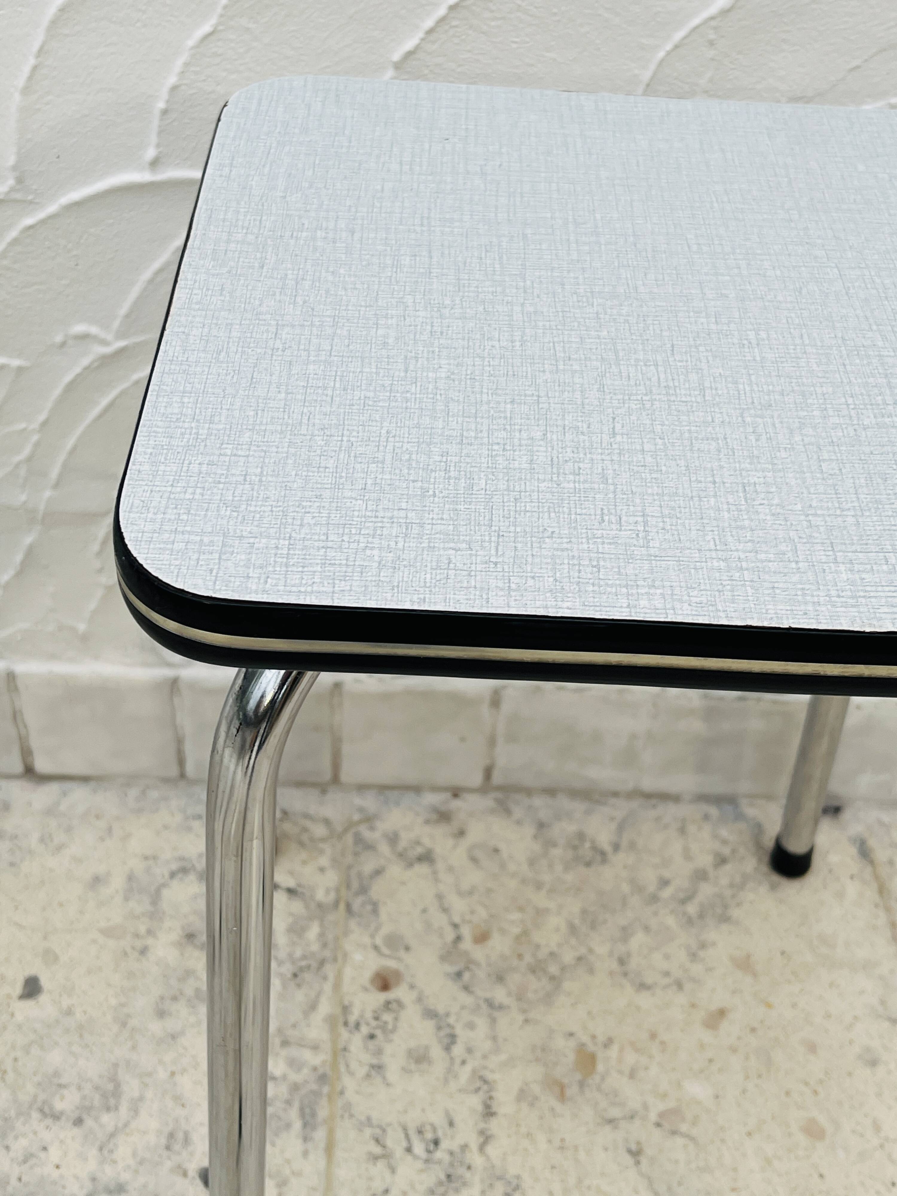 Set of 4 vintage grey chrome Formica stools.