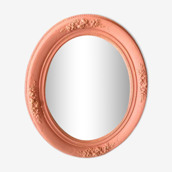 Oval terracotta mirror with pink shapes in resin