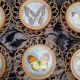 6 coasters in wooden wicker and butterfly background