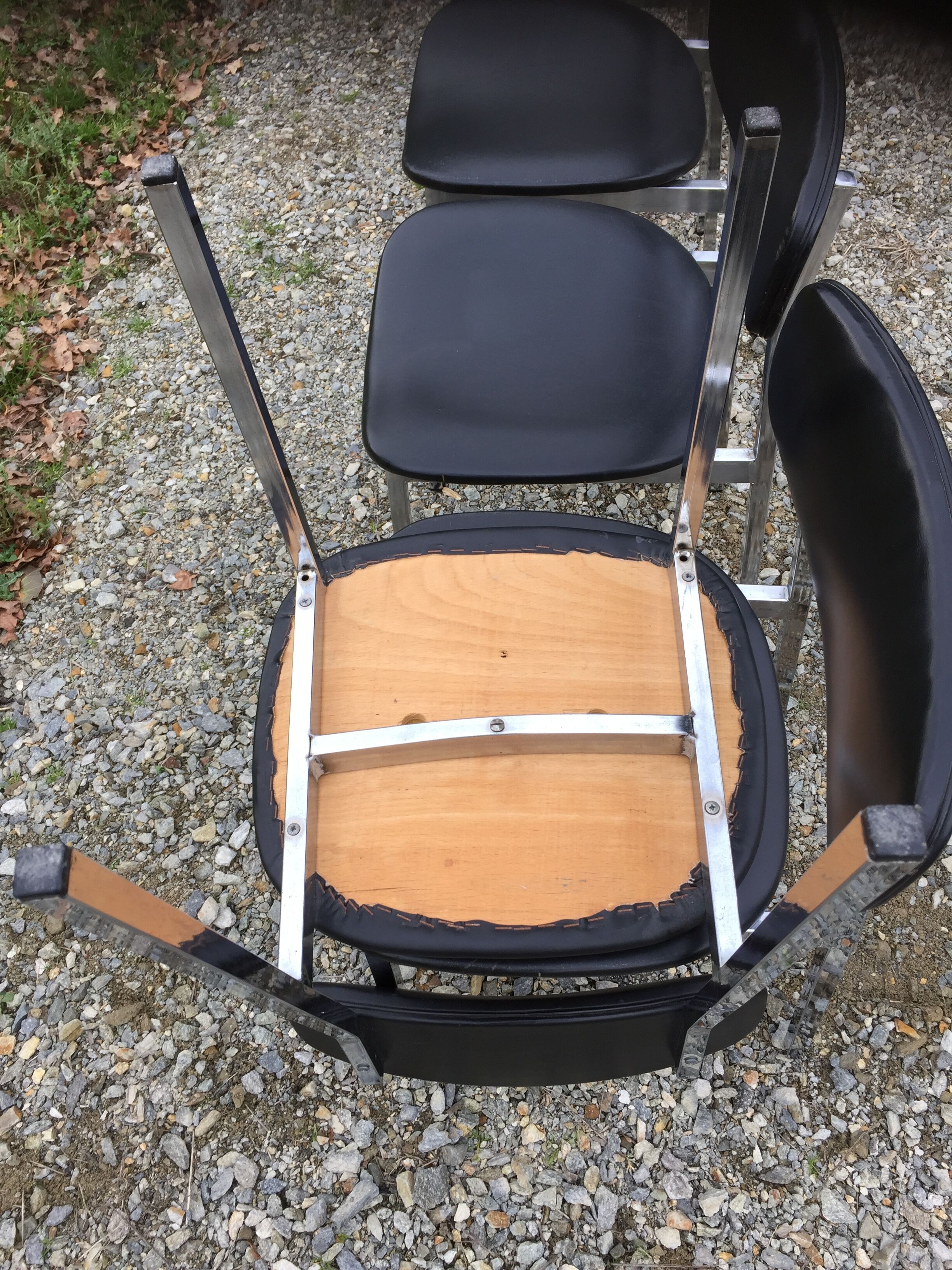 6 vintage chairs in black skaï with chrome metal tubular base.