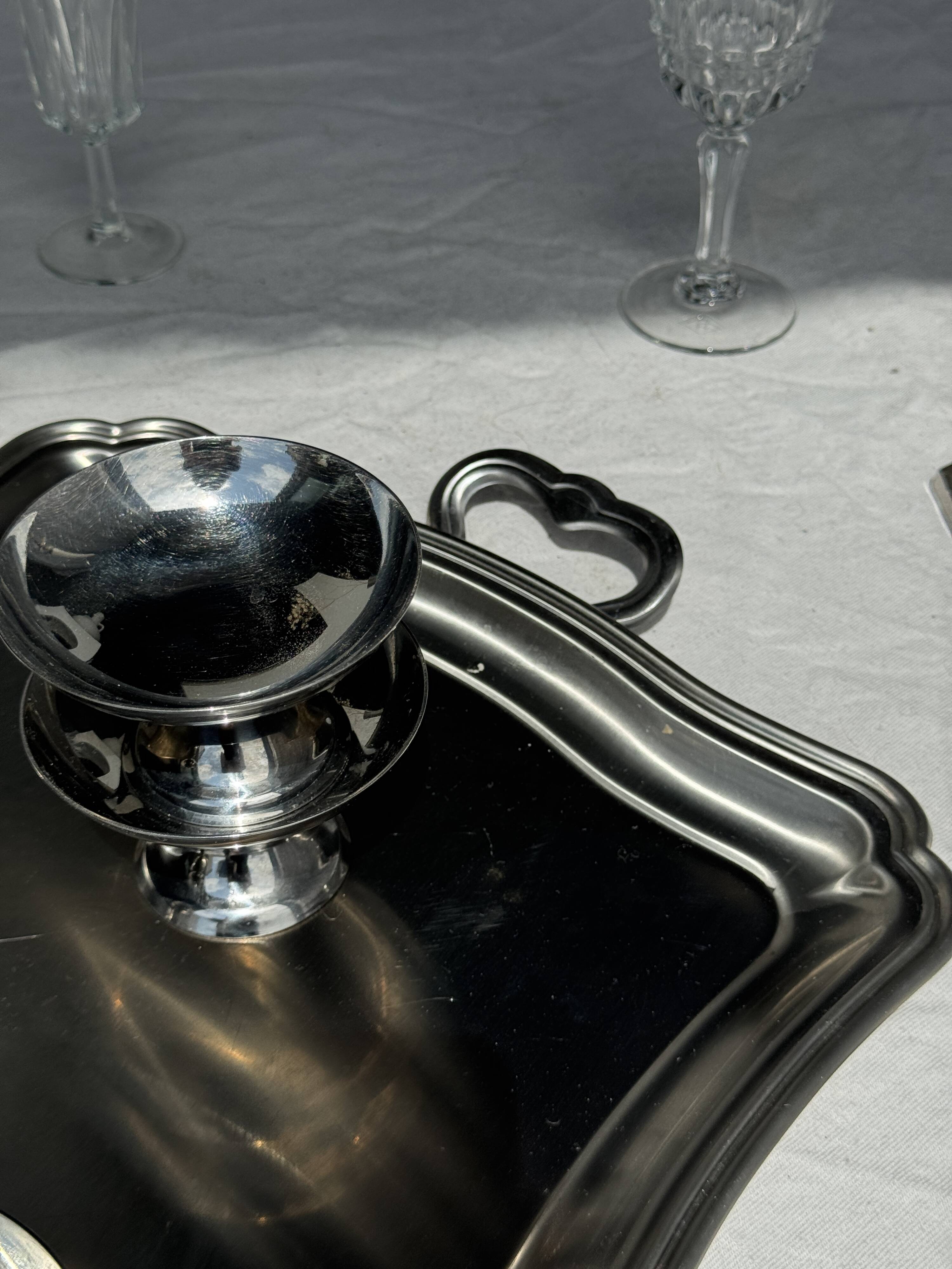 Guy Degrenne silver stainless steel serving tray with an eventful shape