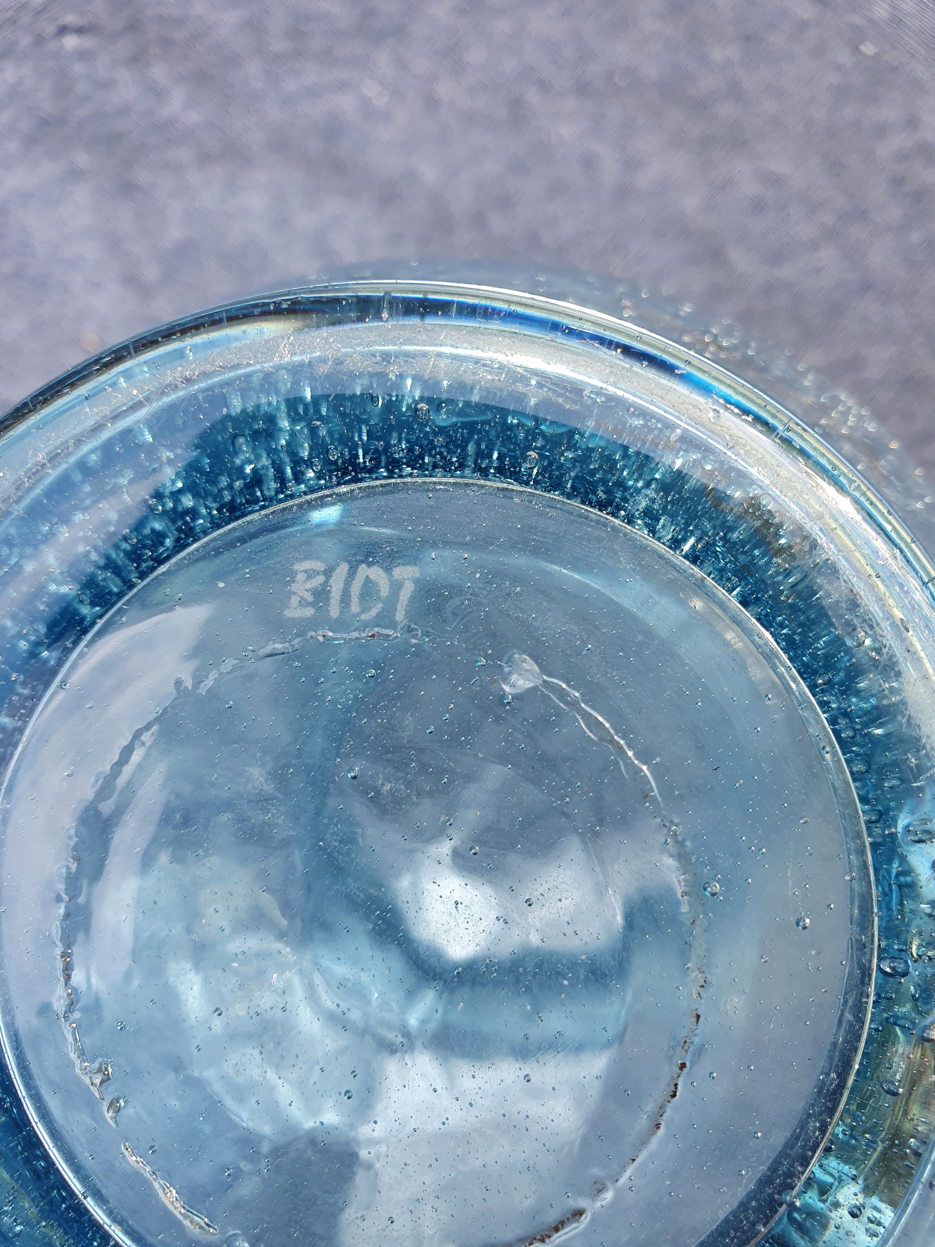 Pitcher or carafe in bubbled glass biot light blue