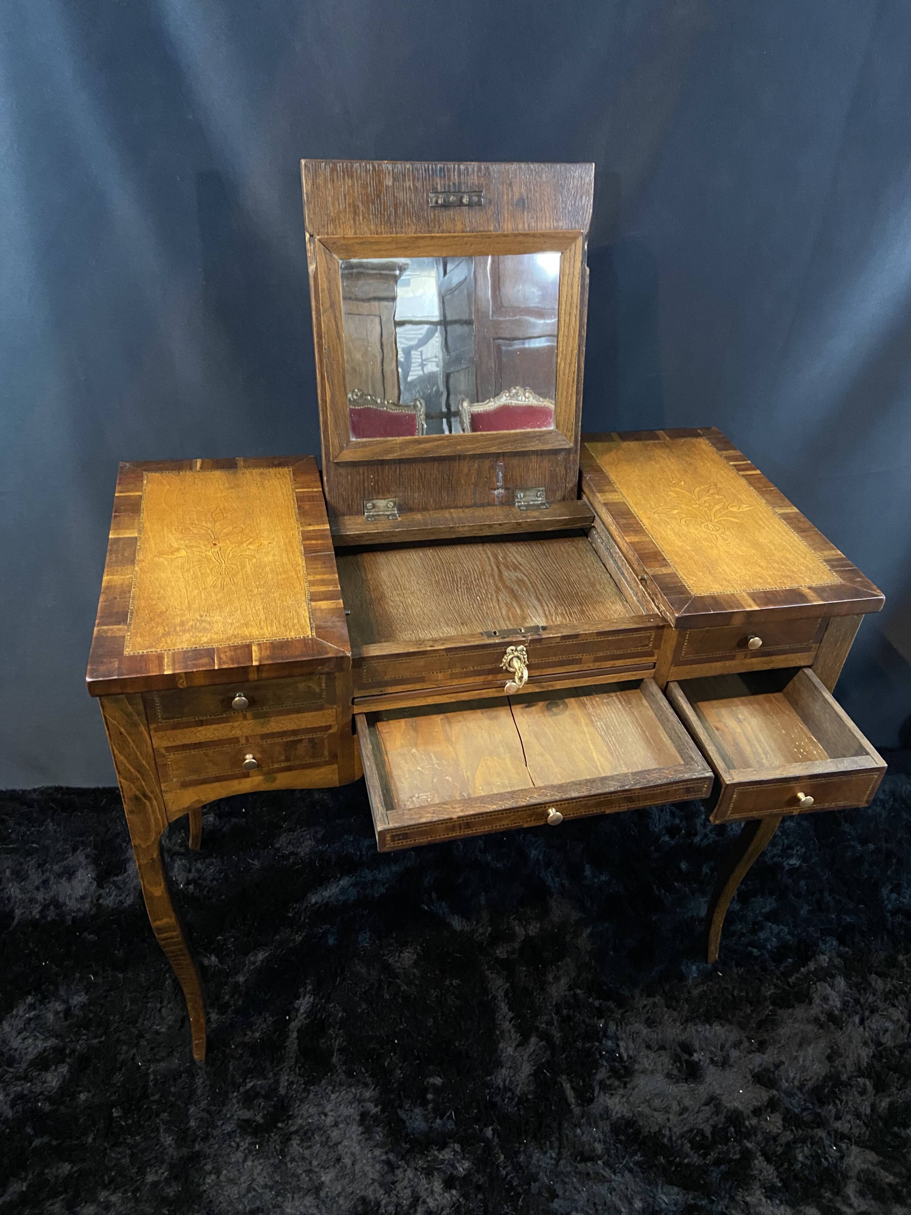 19th-century hairdresser with marquetry decoration on oak in the Louis XV Transition style.