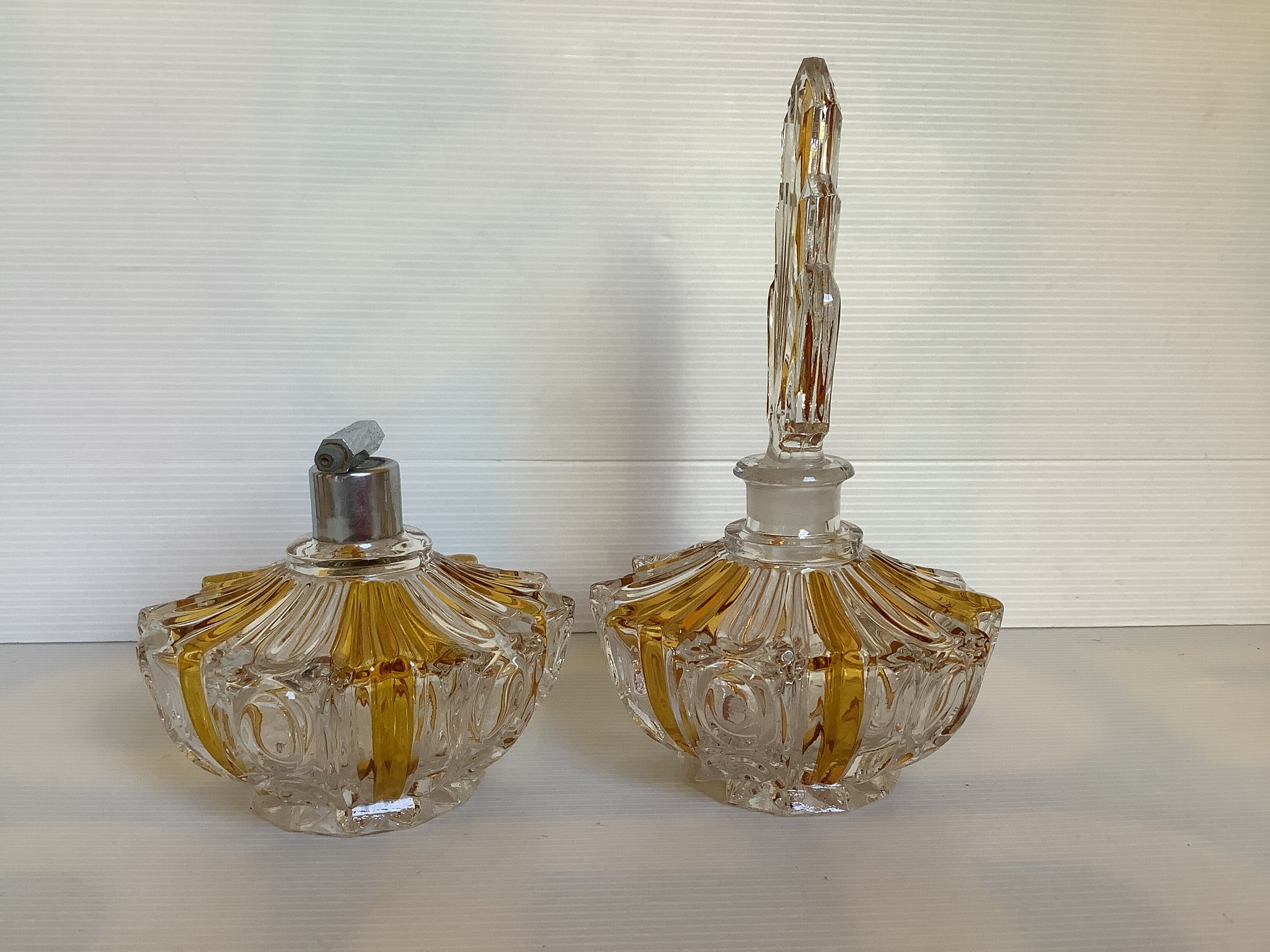Perfume bottles and art deco spray