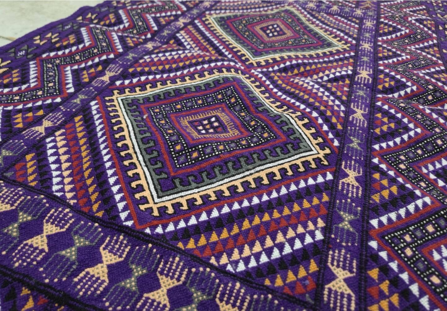 Hand-woven purple margoum rug in natural wool