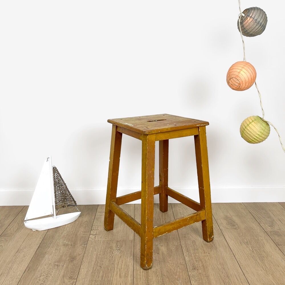 Old slotted milking stool