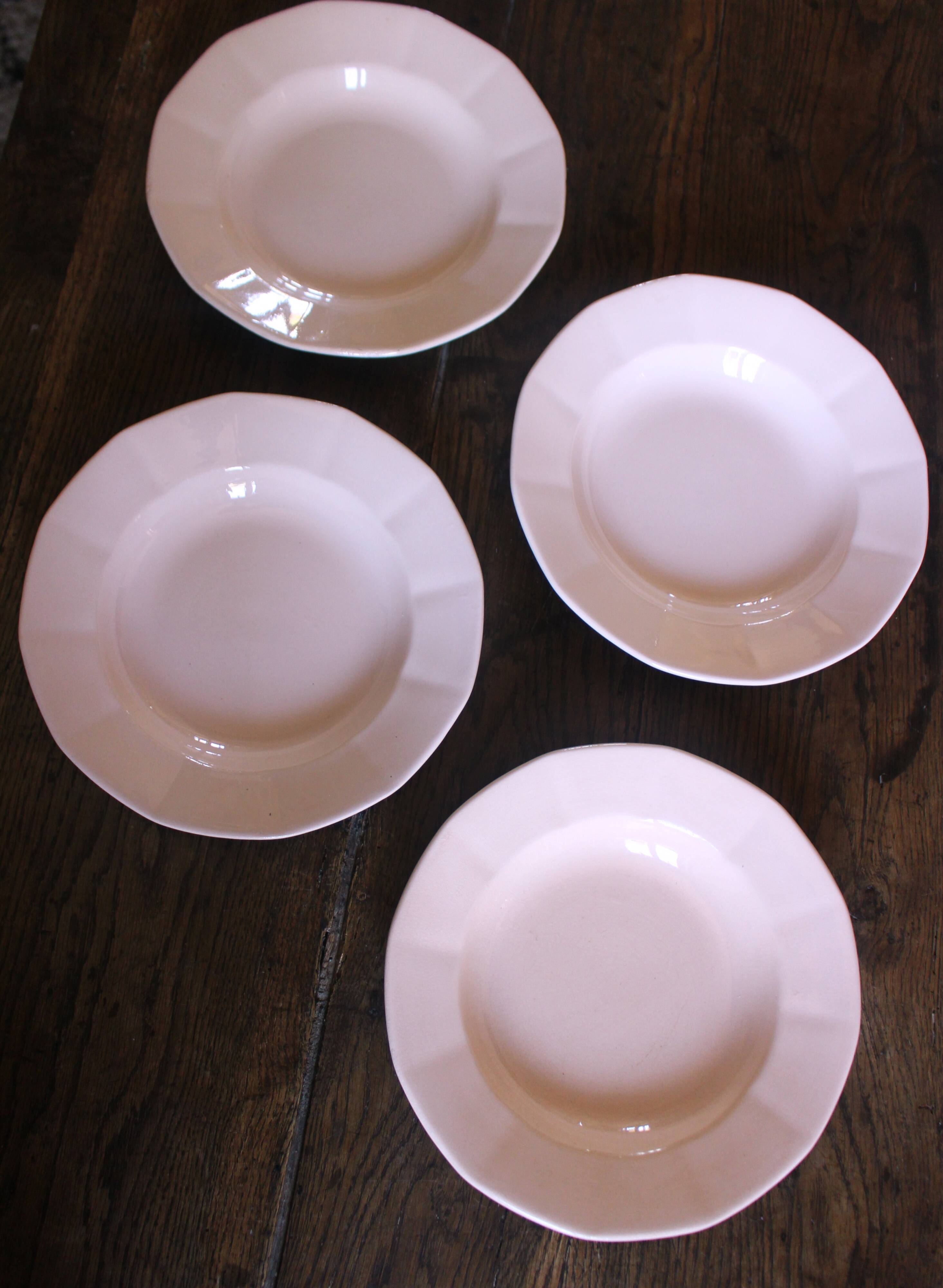 A set of 4 pink deep plates from Digoin Sarreguemines.