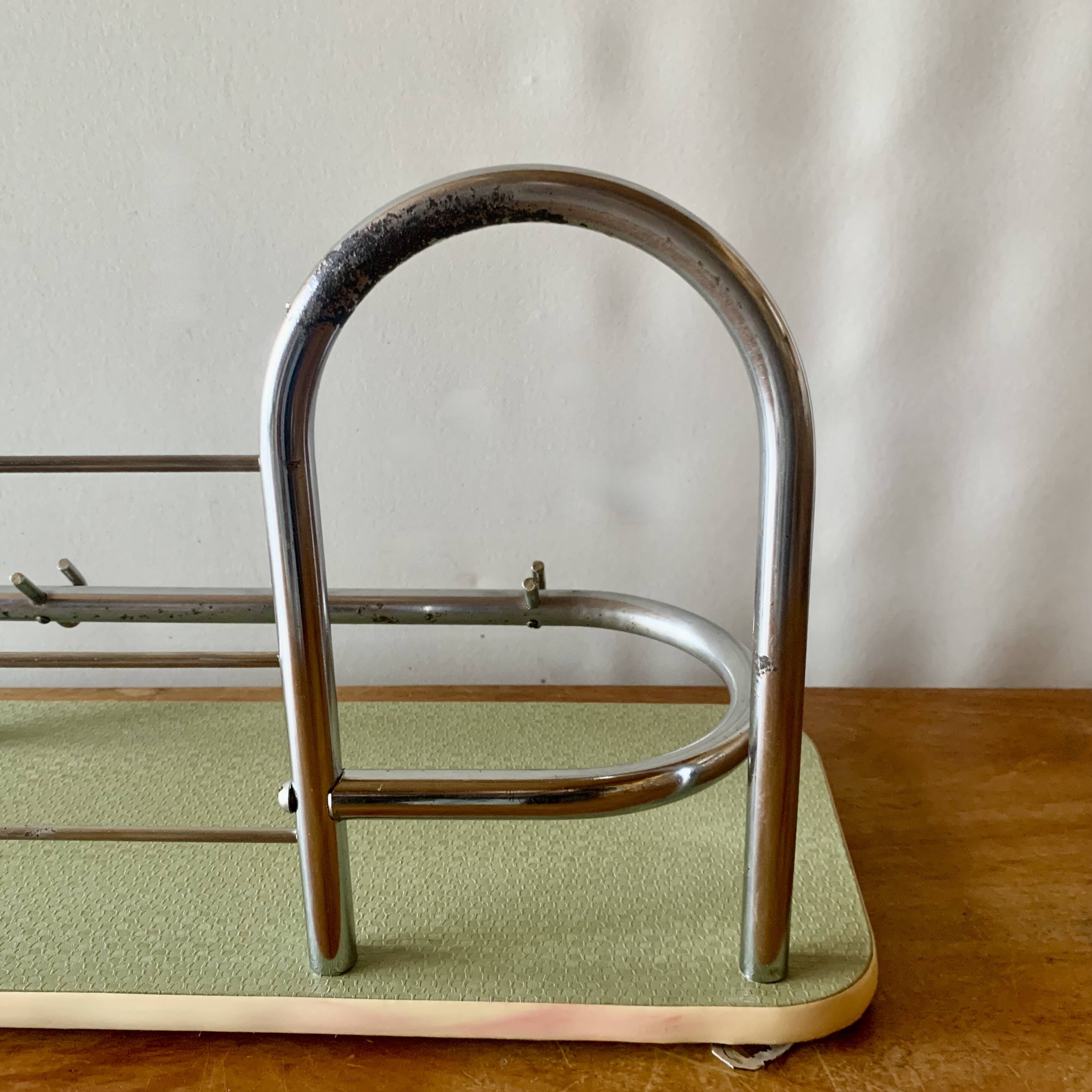 Large vintage wall-mounted coat rack in green Formica and chrome metal