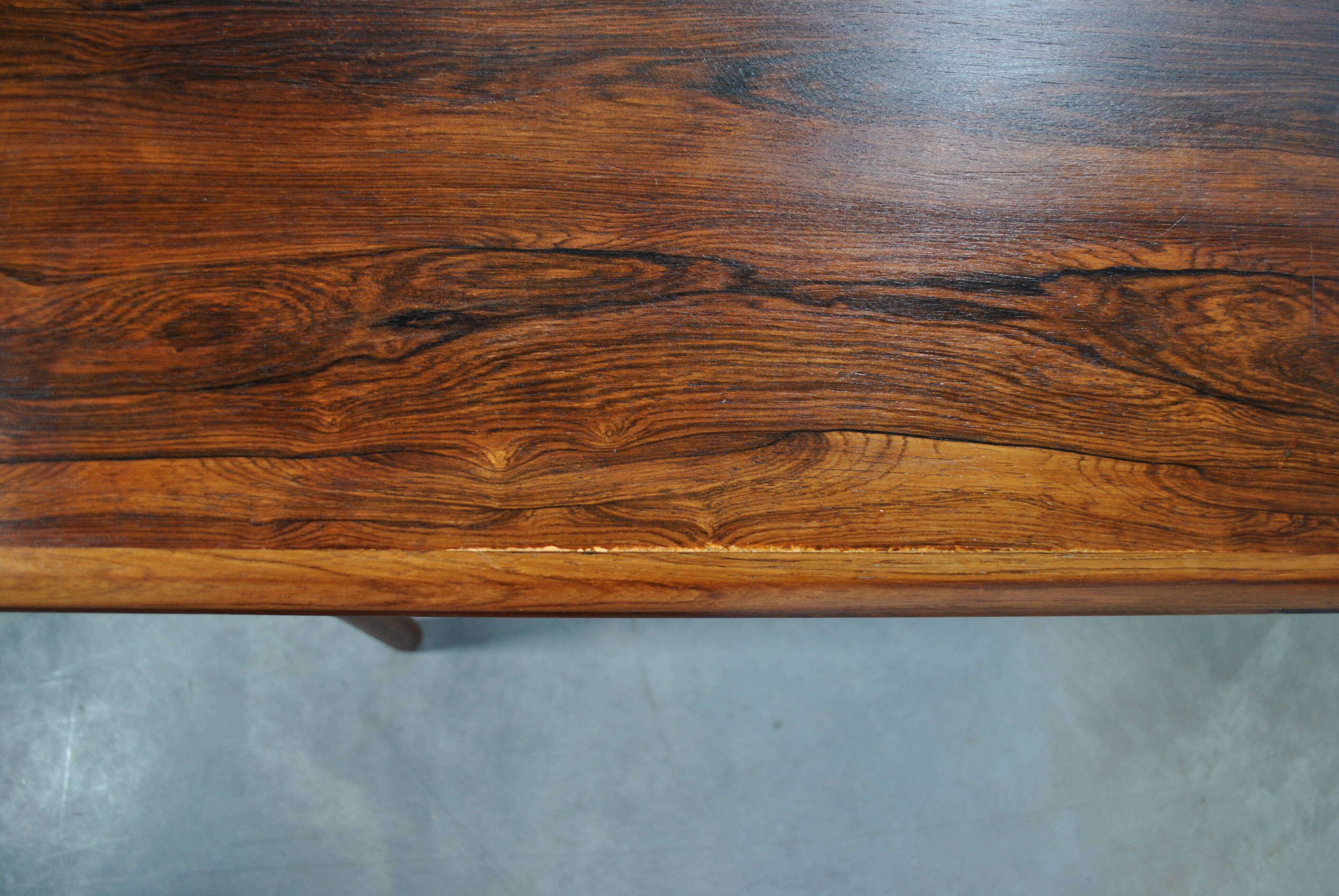 Extendable rosewood dining table year 60