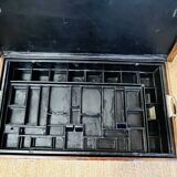 Large Gustave Keller leather trunk with multiple compartments