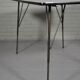 Industrial table with extendable legs