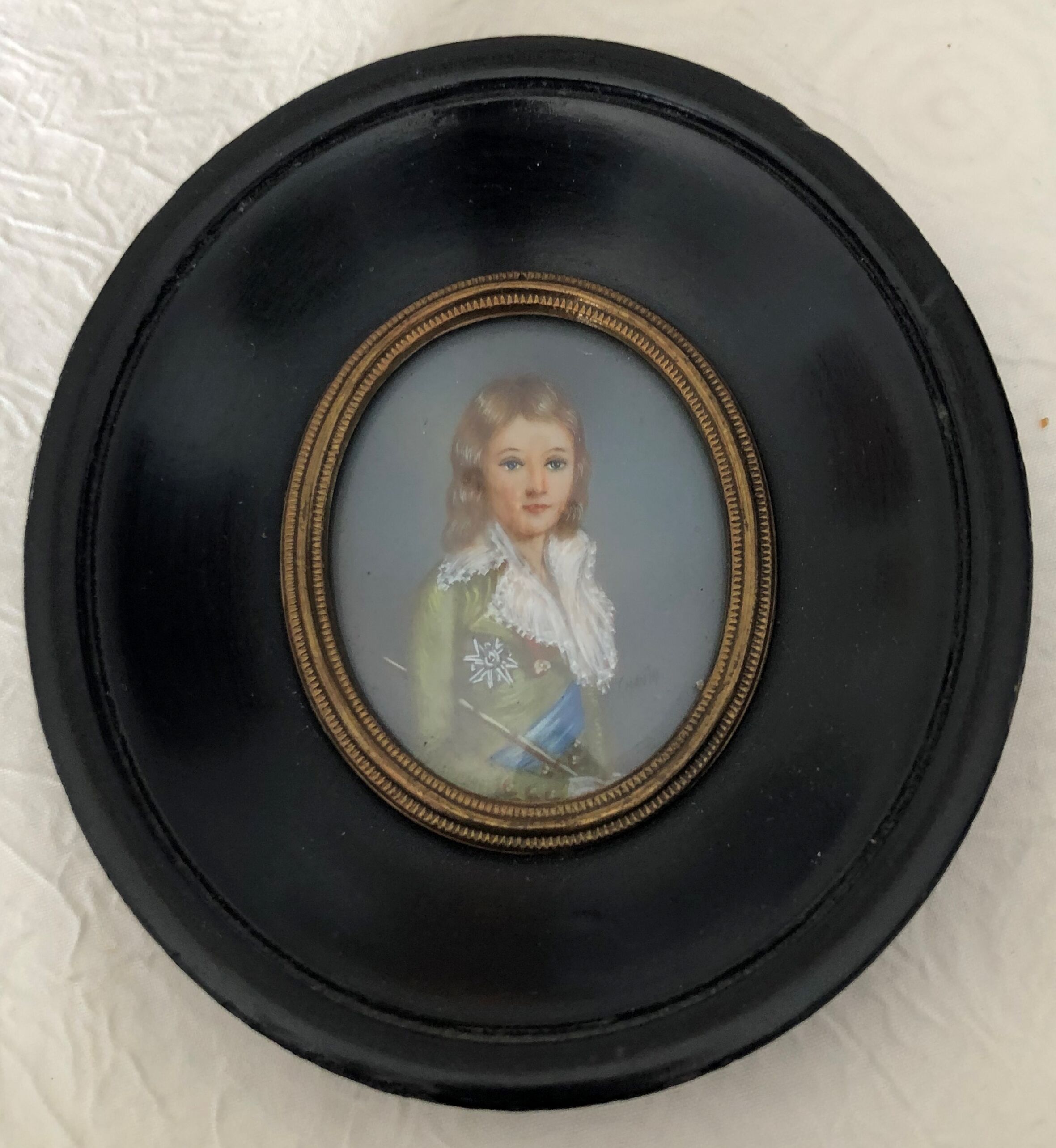 Portrait of a miniature young man