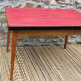 Extendable wooden and formica table