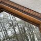 Rustic beveled mirror in molded natural wood 64 x 56 cm