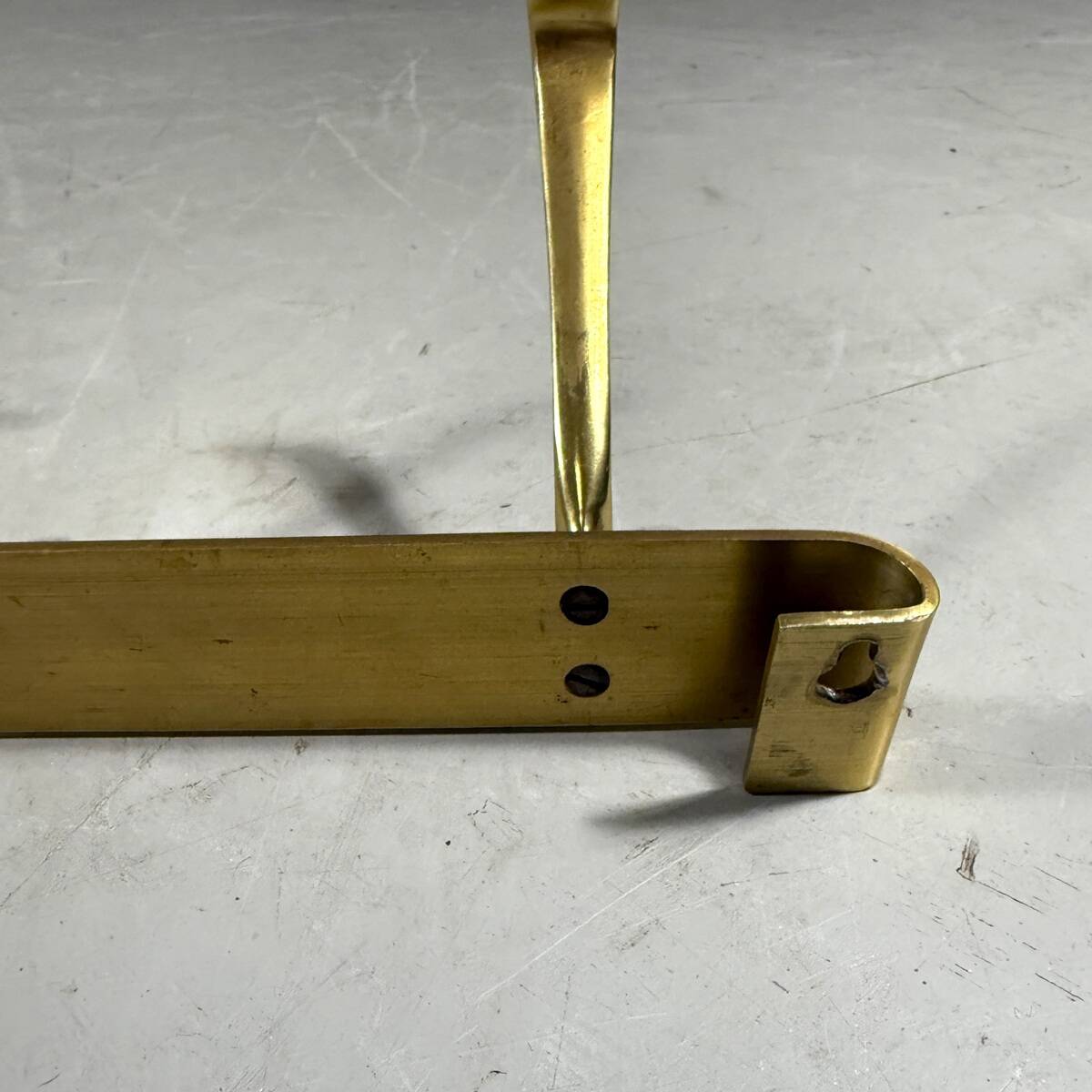 Gold coloured aluminium wall coat rack 1960’s