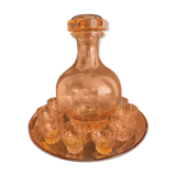 Liquor service in pink moulded glass