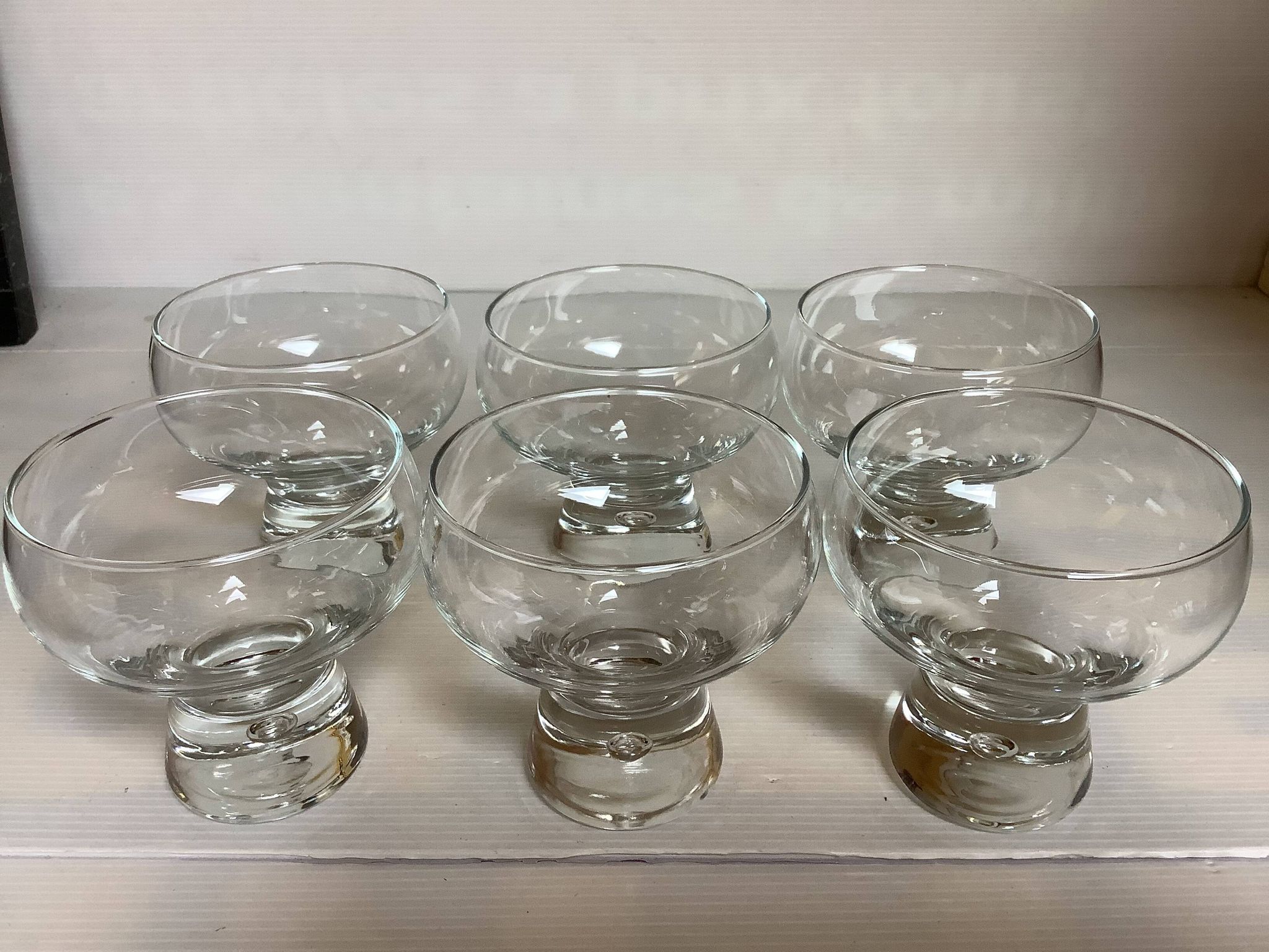 6 large bubble coupe glasses with a foot in the Kosta Boda style.