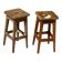 Pair of vintage wooden workshop stools with a patina.