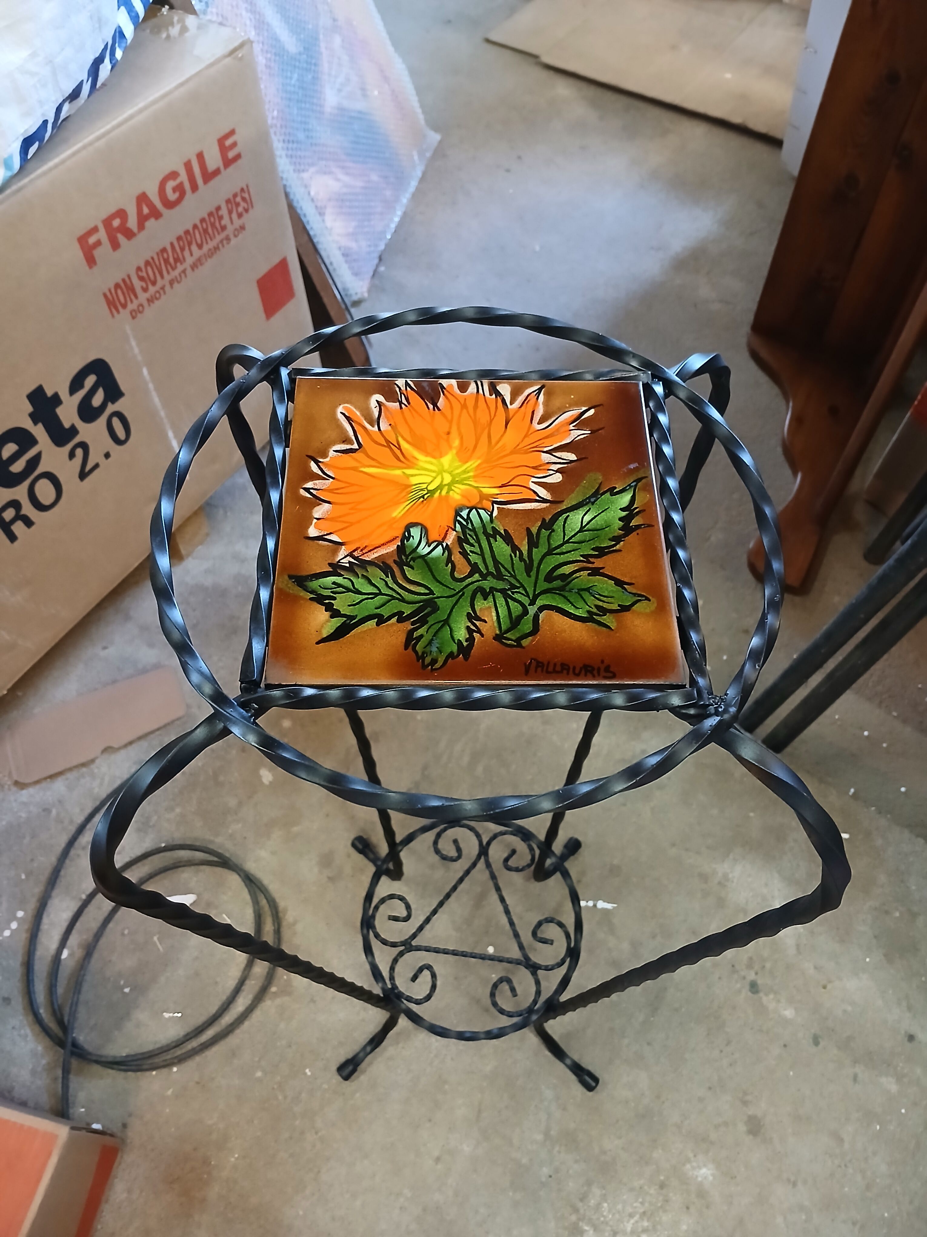 Vintage plant stand with Vallauris pottery.