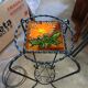 Vintage plant stand with Vallauris pottery.