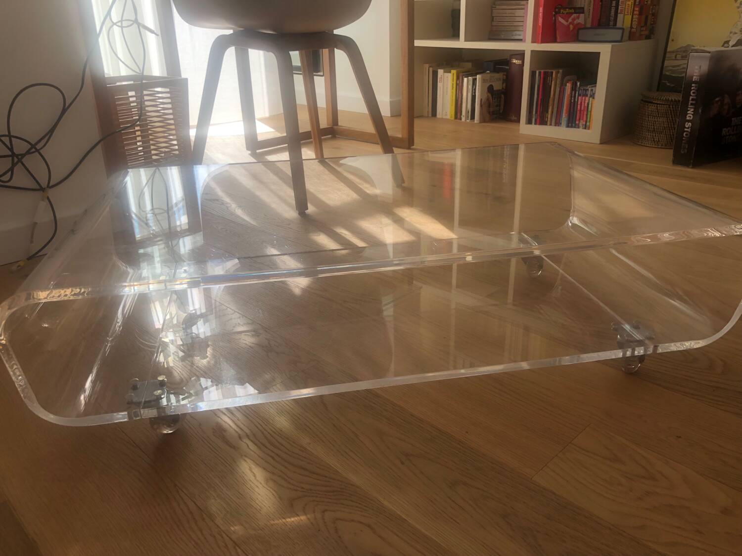 Habitat plexiglass coffee table on wheels