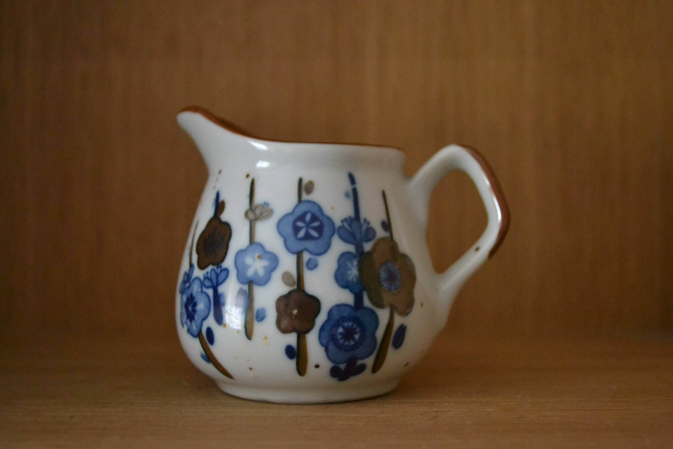 Stoneware milk jug with Japanese motif
