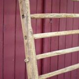 Old vintage wooden animal barrier, wall espalier, plant holder