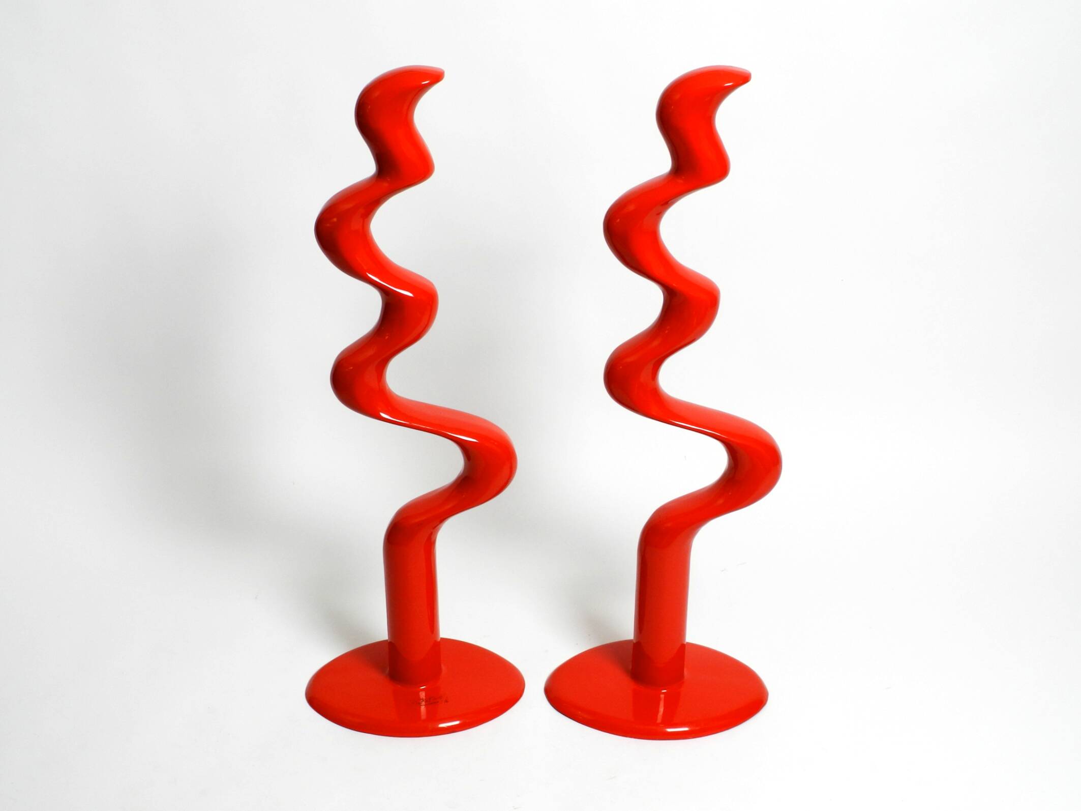 Two large limited abstract metal floor sculptures in red