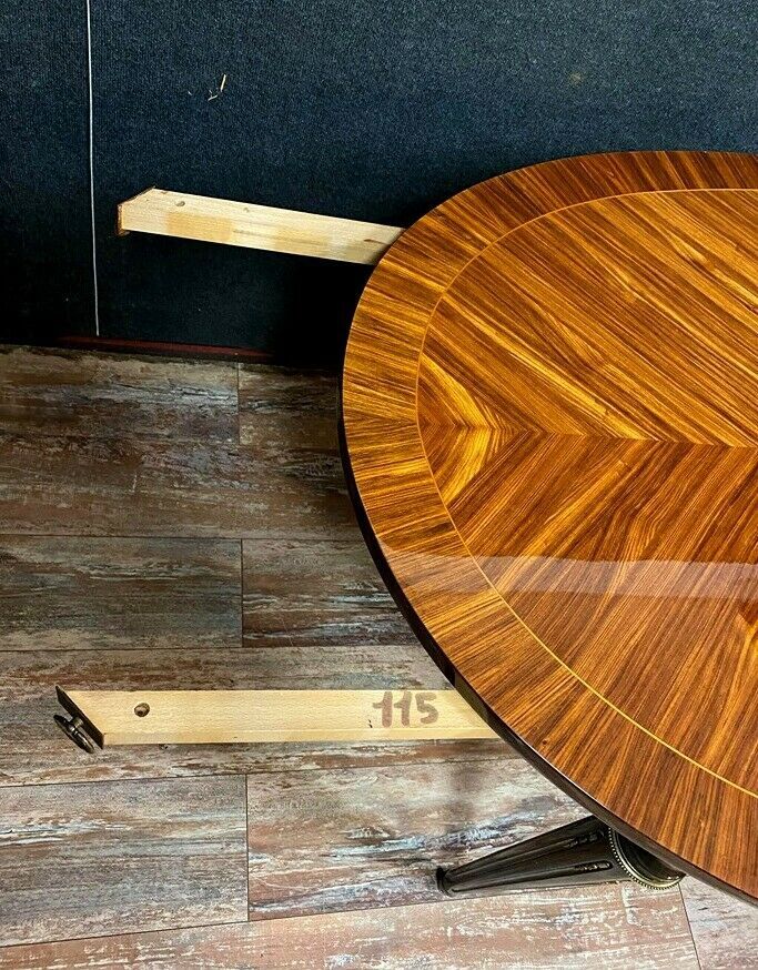 Louis XVI table has extensions in precious wood marquèterie