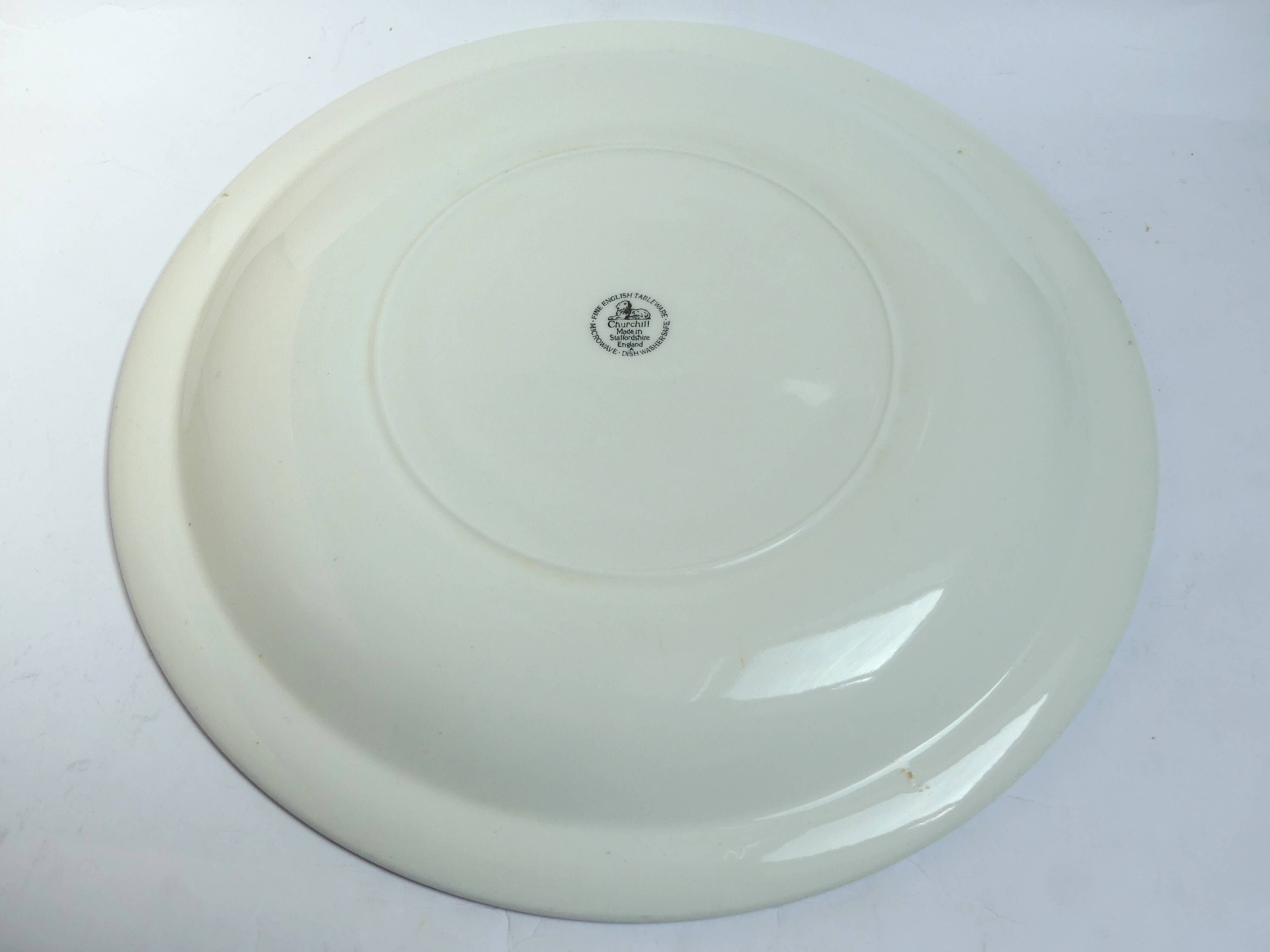 Round plate by Churchill in English porcelain.