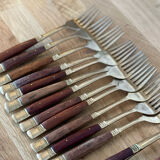 61 covered in rosewood and brass 1950