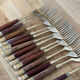 61 covered in rosewood and brass 1950