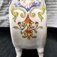 Vintage cache-pot planter in hand-painted earthenware.
