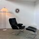 Old armchair and ottoman black leather tubular chrome bauhaus design from the 70s