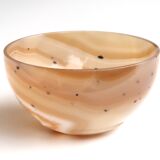 Empty pocket cut in agate