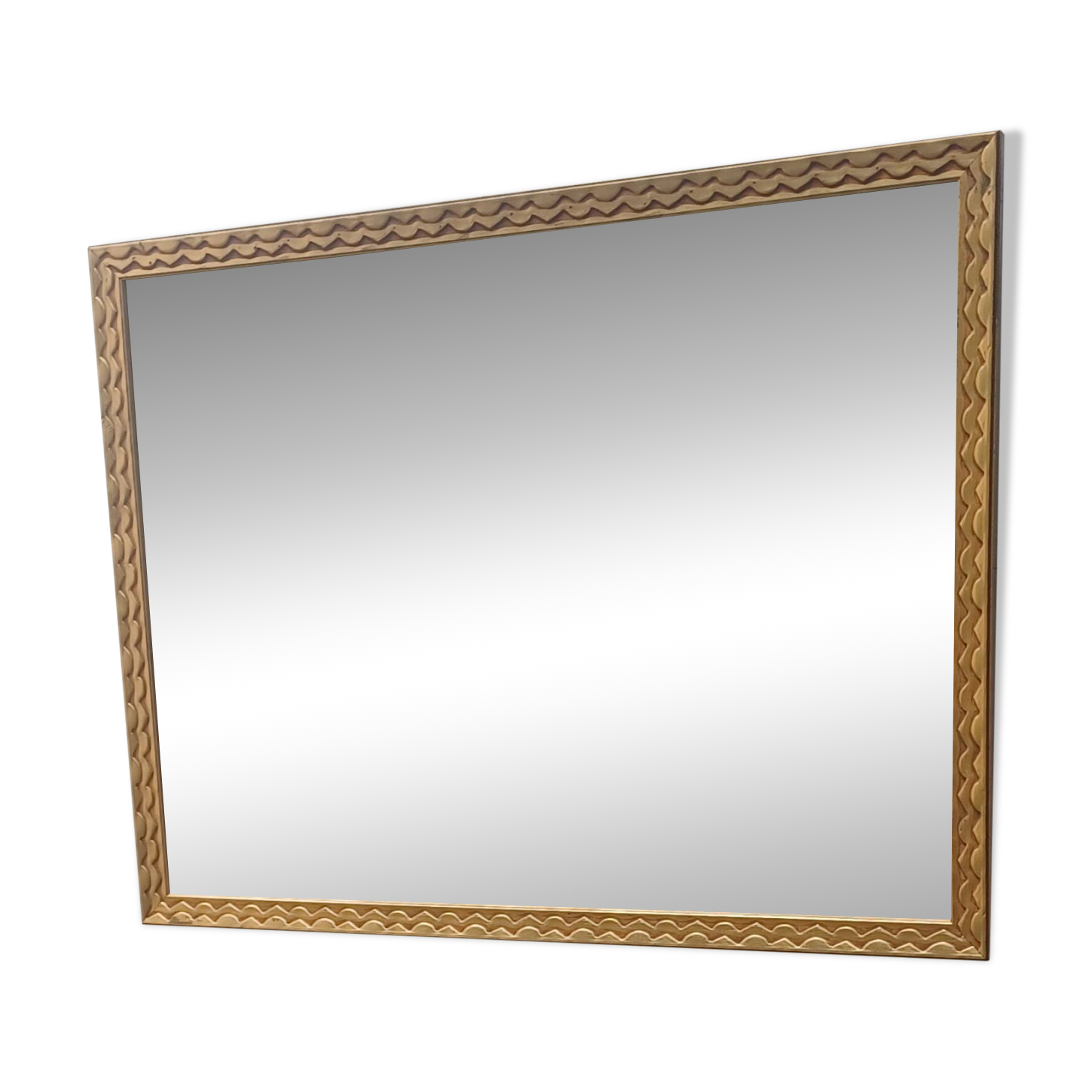 Miroir dore de style art-deco ( 1925-1945) avec  glace biseautee